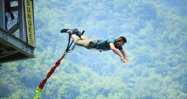 Person mid-air during Bungee Jumping in Rishikesh